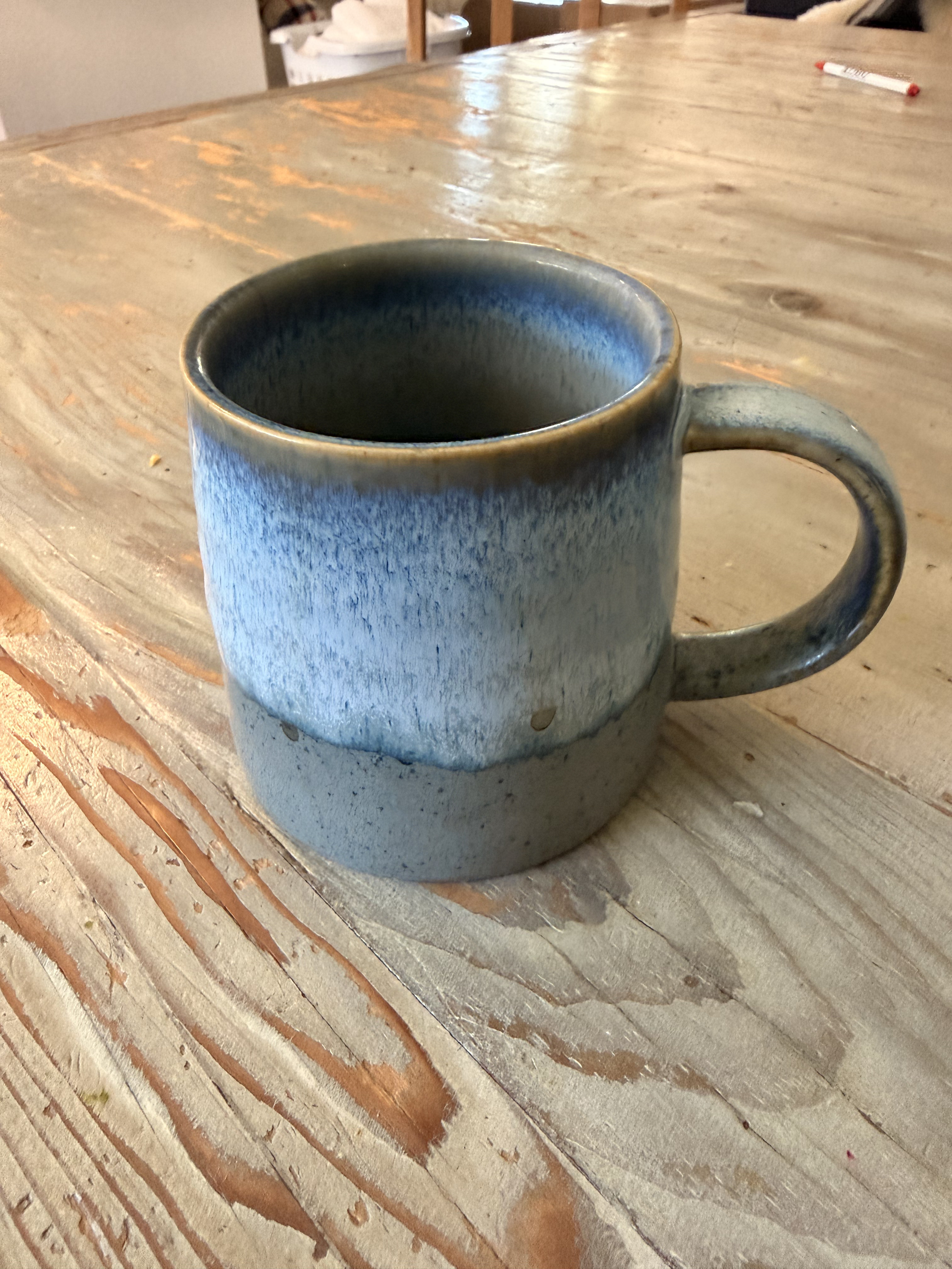 Blue glazed ceramic mug original photo